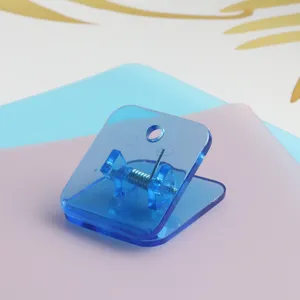 Transparent blue acrylic square binder clip for journaling, office and school organization.