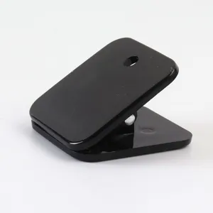 Black acrylic memo clip for office paper organizer and document binding detail view.