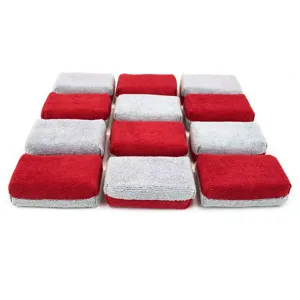 Microfiber dual-color sponge blocks detail view for car waxing and cleaning application.
