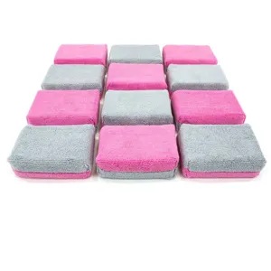Dual-color microfiber waxing sponge blocks for car cleaning, detailing, and polishing use.