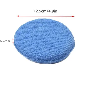Detailed view of blue microfiber car waxing sponge pad, professional polishing tool.