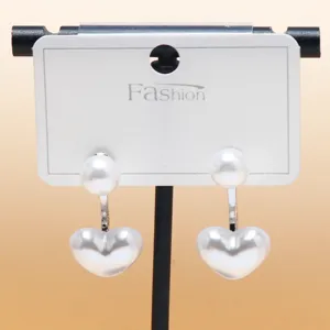 Elegant double-sided heart pearl earrings with elegant display card for women daily wear style.