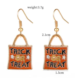Halloween trick or treat shopping bag drop earrings gold metal enamel holiday party jewelry