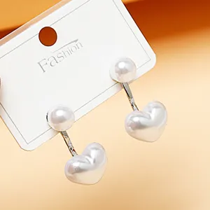 Elegant pearl heart earrings with double-sided design, trendy fashion jewelry for women.