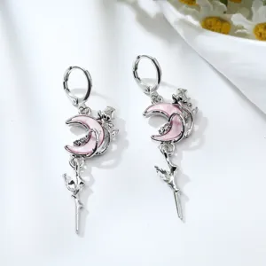 Pink crescent moon and rose drop earrings detail, sparkling rhinestone alloy jewelry design.