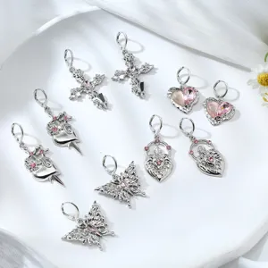 Y2K punk style pink rhinestone alloy earrings set featuring cross butterfly and heart details
