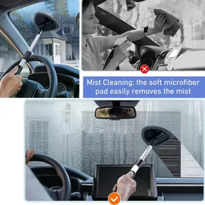 Car windshield cleaning tool with telescopic handle and microfiber pad for interior auto care.