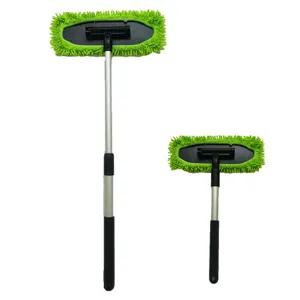 Car windshield cleaner tool detail showing telescopic handle and green microfiber mop head.