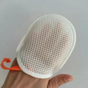 Close-up detail of white mesh soap bag, breathable sandwich mesh design for rich foaming and easy washing.