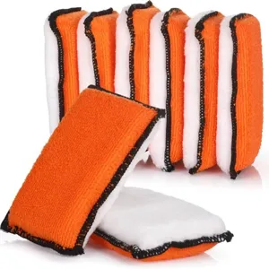 Car cleaning sponge detail showing soft coral fleece and absorbent layers for interior.