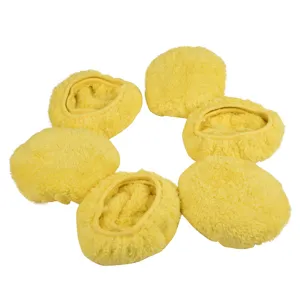 Microfiber cleaning pad detail shot for window cleaner robot, soft yellow plush bonnet replacement.