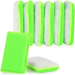 Close-up detail of double-sided car cleaning sponge featuring green fleece and white foam.