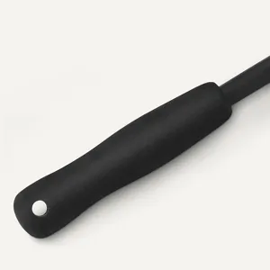 Black ergonomic cleaning brush handle detail with hanging hole for car wheel rim washing.