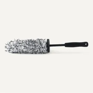Close-up detail of the black and white microfiber car wheel cleaning brush head.