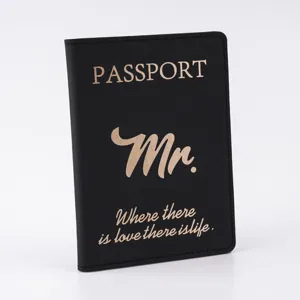 Black PU leather passport holder with gold print for travel, secure card and ticket organizer case.