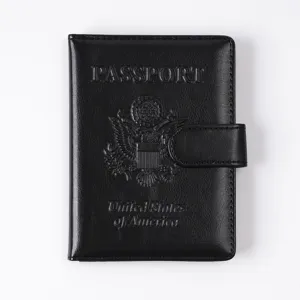 Black PU leather RFID blocking passport holder with snap closure and embossed USA design.