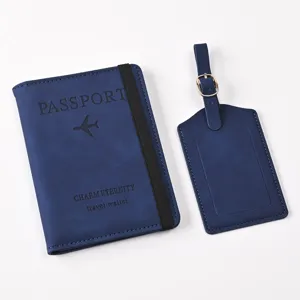 Blue PU leather passport holder and luggage tag set with elastic band for safe travel.