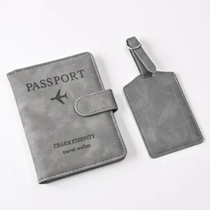 Grey PU leather passport holder and luggage tag set with magnetic buckle and travel design.