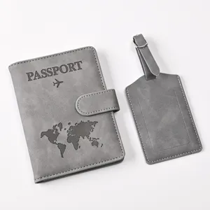 Grey PU leather passport holder and luggage tag set with world map design and magnetic snap.