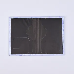 Interior detail view of the PU leather passport holder showcasing multiple card slots and pockets.