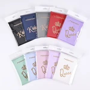 Detailed showcase of colorful PU leather passport holders with elegant crown prints inside bags.