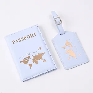 Details of light blue PU passport holder and luggage tag set with gold foil world map.
