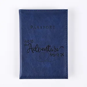 Blue PU leather passport cover with travel quote, stylish travel wallet and document holder.