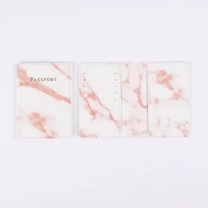 Pink marble pattern PU leather passport cover with card slots and travel wallet holder.