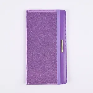 Purple glitter PU leather passport holder detail close-up, elastic band and metal accent.