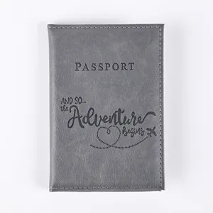 Detailed close-up view of gray PU leather passport cover, fine texture and neat stitching details.