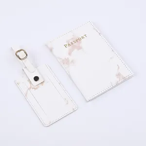 Marble PU leather passport holder and luggage tag detail shot, elegant travel accessory set.