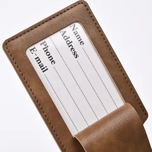 Detailed view of brown PU leather luggage tag card slot insert design clear identification