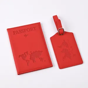 Red PU leather passport holder and luggage tag travel set with world map debossed design.