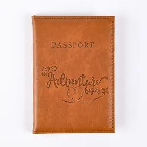 Brown PU leather passport holder detail view, travel document organizer card case.