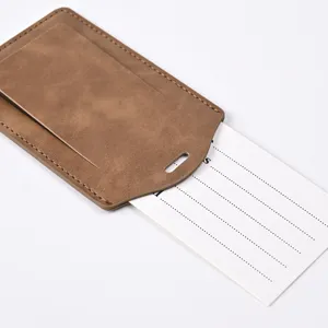 Brown PU leather luggage tag with card slot and paper insert for travel identification.