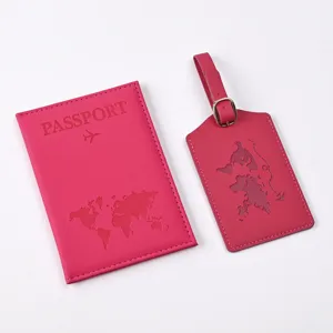 Pink PU leather passport holder and luggage tag set, detailed view with world map pattern.