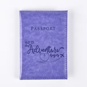 Purple PU leather passport cover with travel quote, stylish document holder for travel.
