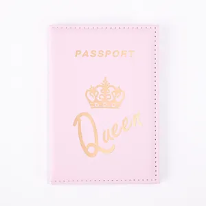 Pink PU leather passport cover with crown print, elegant travel wallet and document organizer.