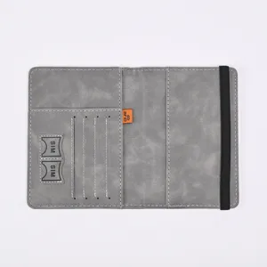 Grey PU leather passport holder with card slots, SIM pockets, and secure elastic band.