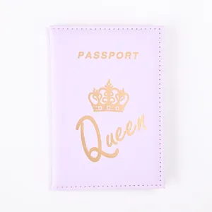 Purple PU leather passport holder case with elegant crown design for travel and secure ID storage.