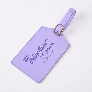 Embossed PU leather luggage tag with cute adventure quote design for travel bags and suitcases.