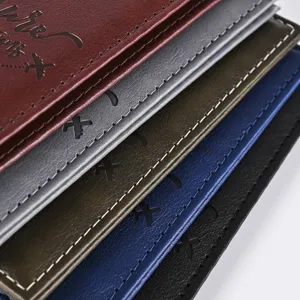 Close-up detail of multi-color PU leather passport covers, textured travel document holders.