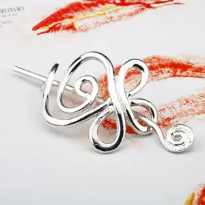 Viking Celtic metal hair stick detail shot, vintage hairpin accessory for women.