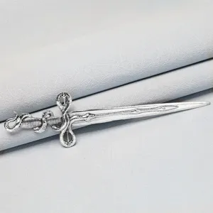 Detail view of the cold style silver sword metal hairpin for stylish hair styling.