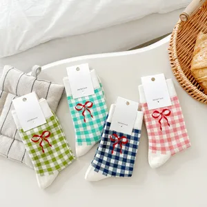 Colorful grid bow mid-tube cotton socks featuring cute ribbon design, soft daily casual wear.