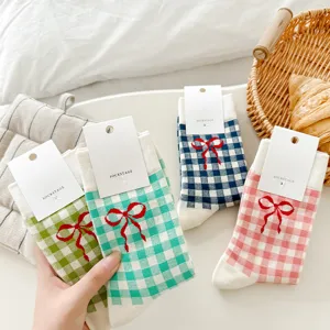 Korean cute plaid bow cotton mid-calf socks for women, sweet casual daily student wear.
