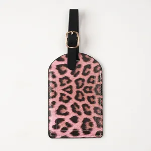 Stilvoller pinker Leo-Print PU-Leder Kofferanhänger mit schwarzem Riemen für Reisen.