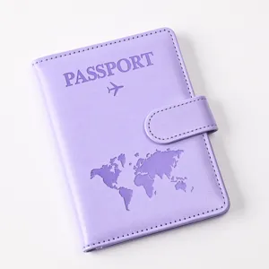 Purple PU leather passport holder featuring a magnetic buckle, world map and passport text detail.