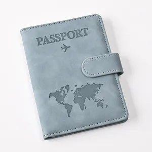 PU leather passport cover with magnetic buckle and world map embossing, travel card holder.