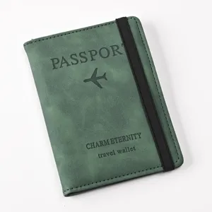 Green PU leather passport cover wallet with elastic band for travel document storage detail.